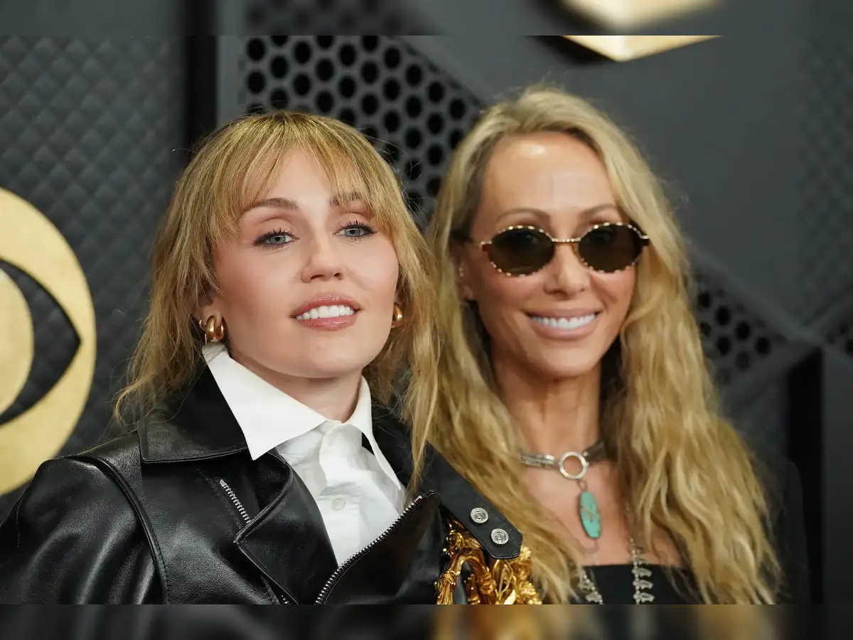 Miley Cyrus returns as Hannah Montana for 20th anniversary special, shares  throwback posts and iconic Disney moments - The Economic Times