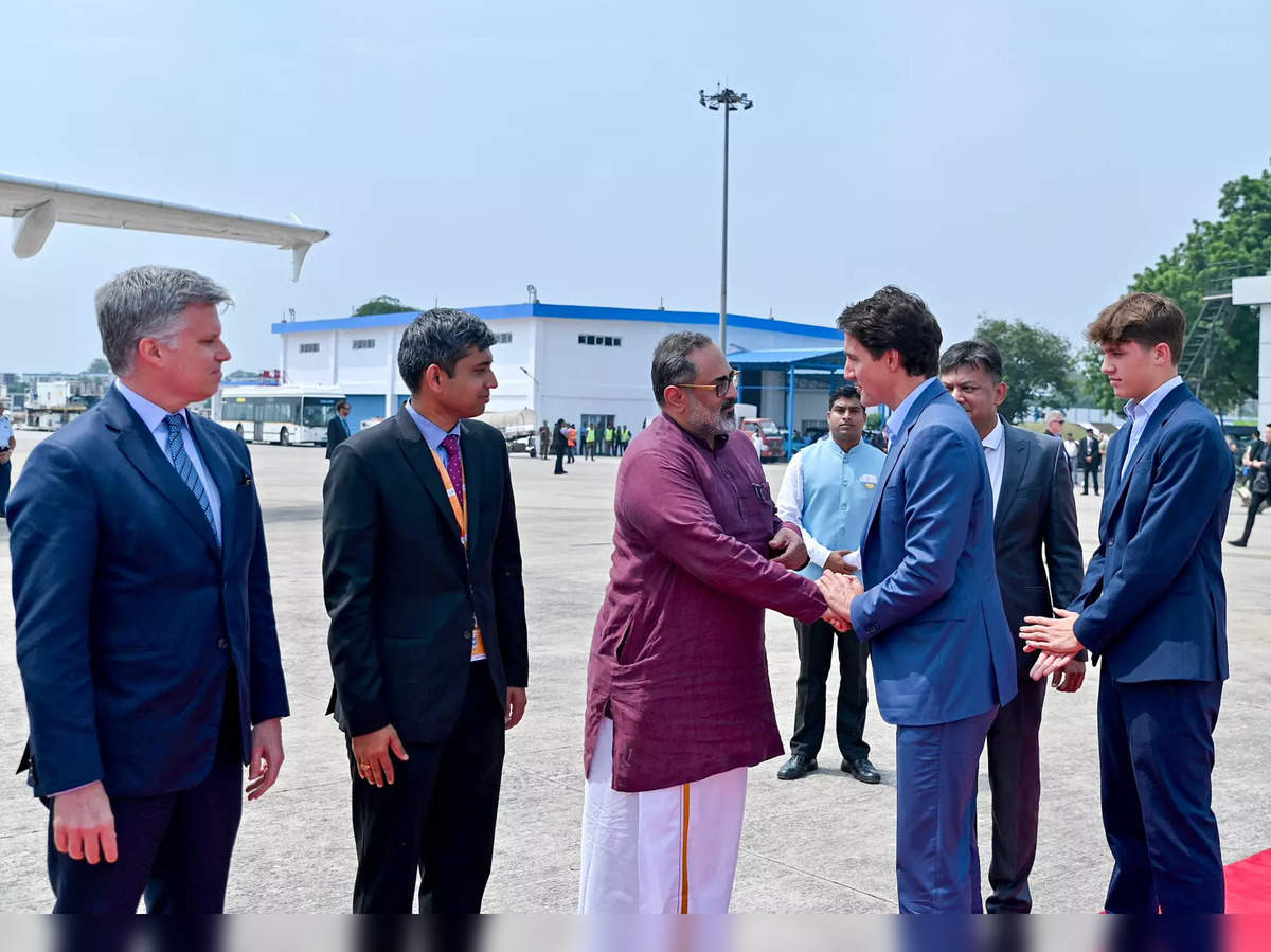 [Image of Justin Trudeau standing in front of an Air India One aircraft]