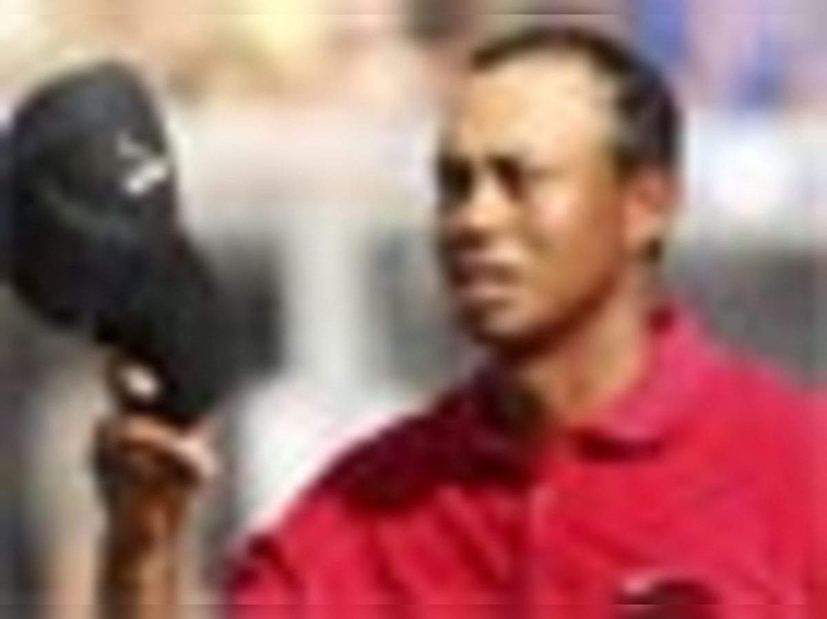 Tiger Woods ads pulled as alleged sex photos surface photo