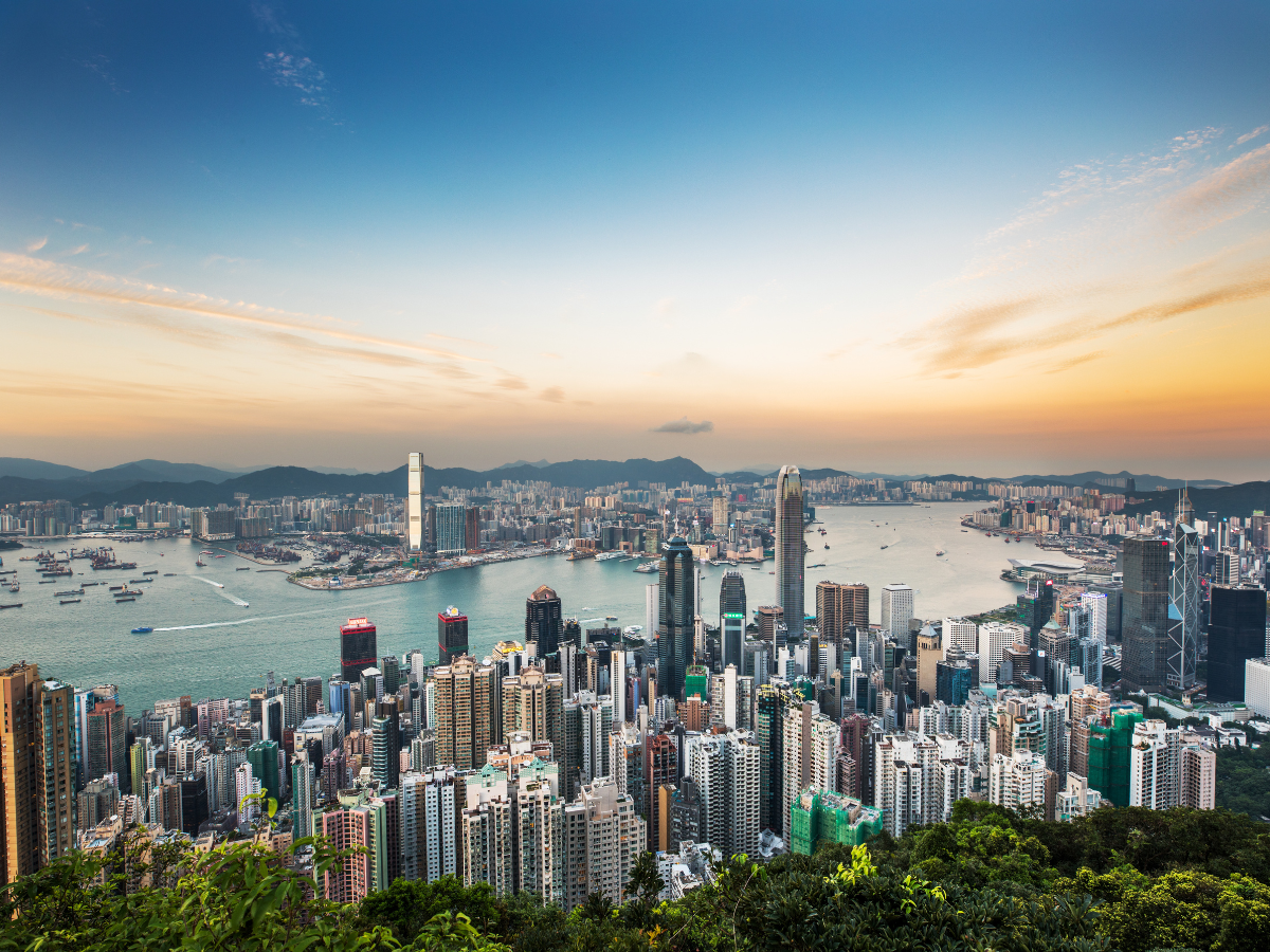 Hong Kong cuts taxes for foreign home buyers, stock traders as it