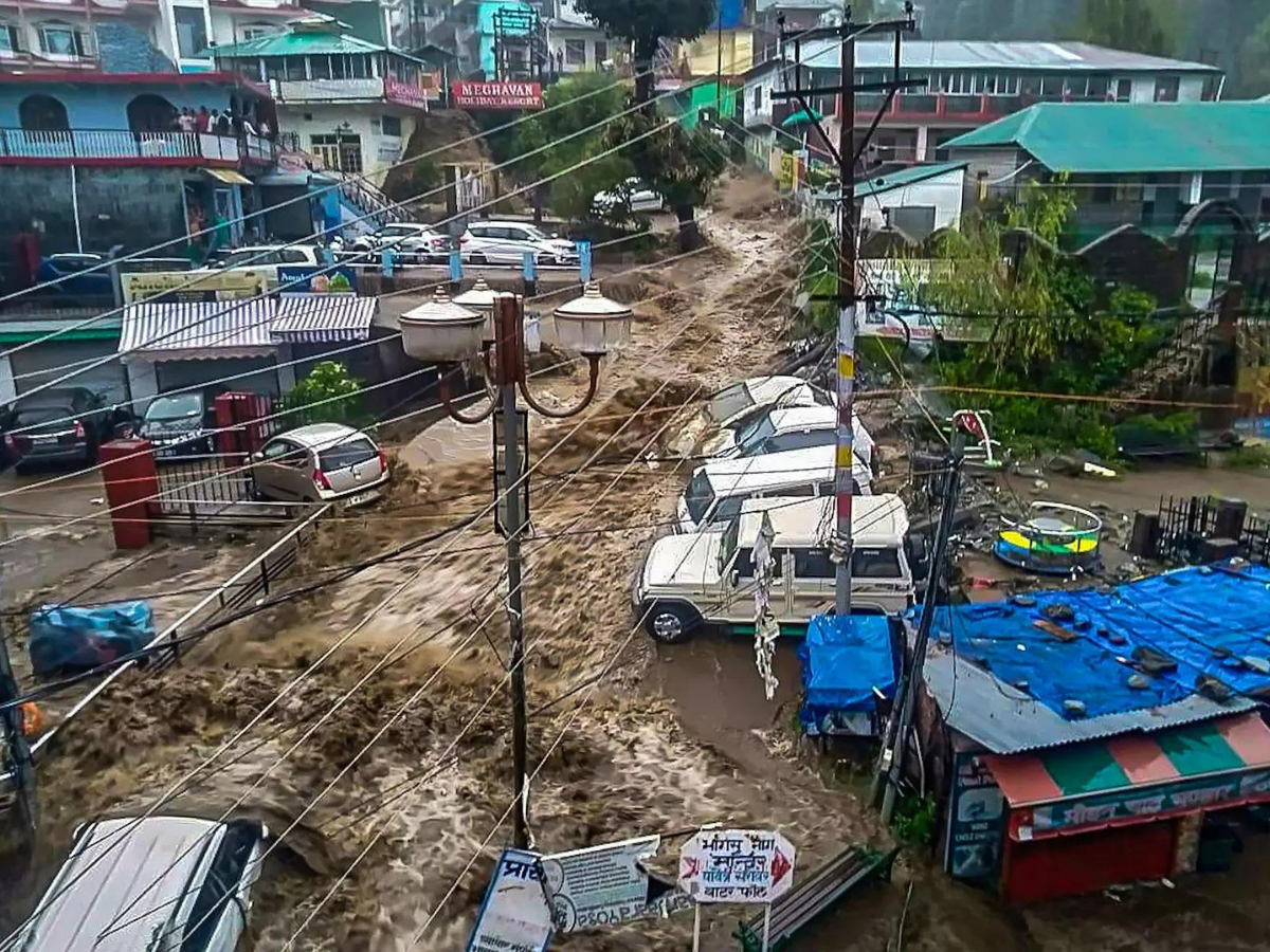 cars, buildings swept away in flash floods triggered by heavy rains in hp's dharamshala - the economic times