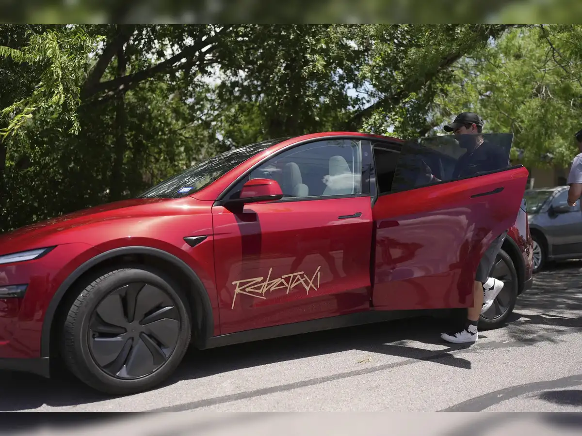 Would you hail a 'robotaxi'? Musk bets cabs will give Tesla a lift after  boycotts and sales plunge - The Economic Times