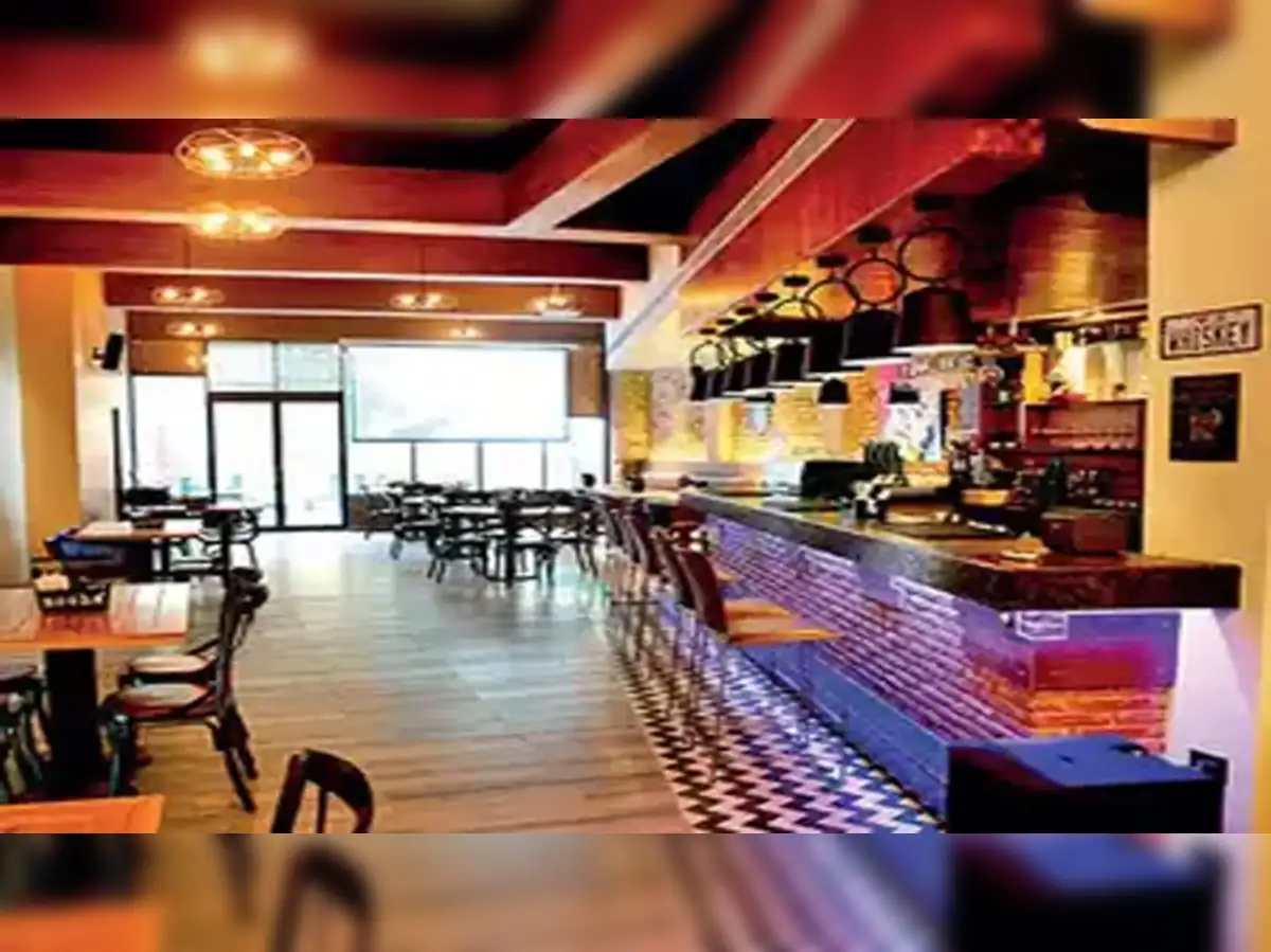 An AI-powered coffee machine serving a latte in a modern, minimalist cafe in Stockholm.