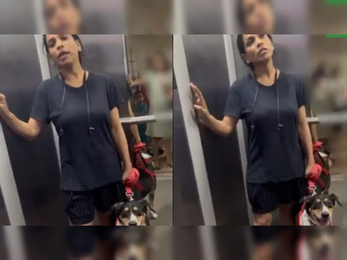 Noida Dog: Viral video ignites debate as dog owner refuses to muzzle pet in  Noida housing society lift - The Economic Times