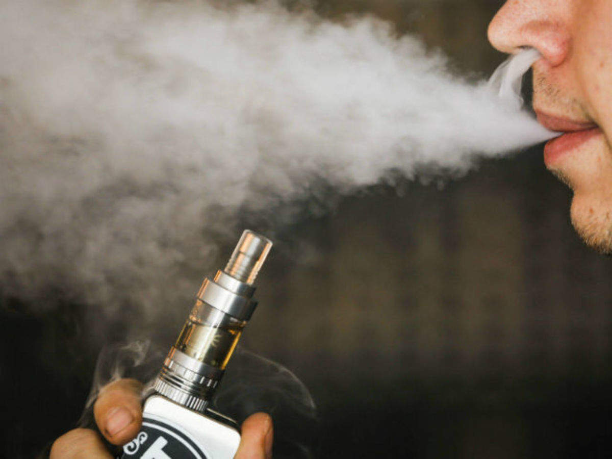 E cigarette vapour can kill lung cells Scientist The Economic Times