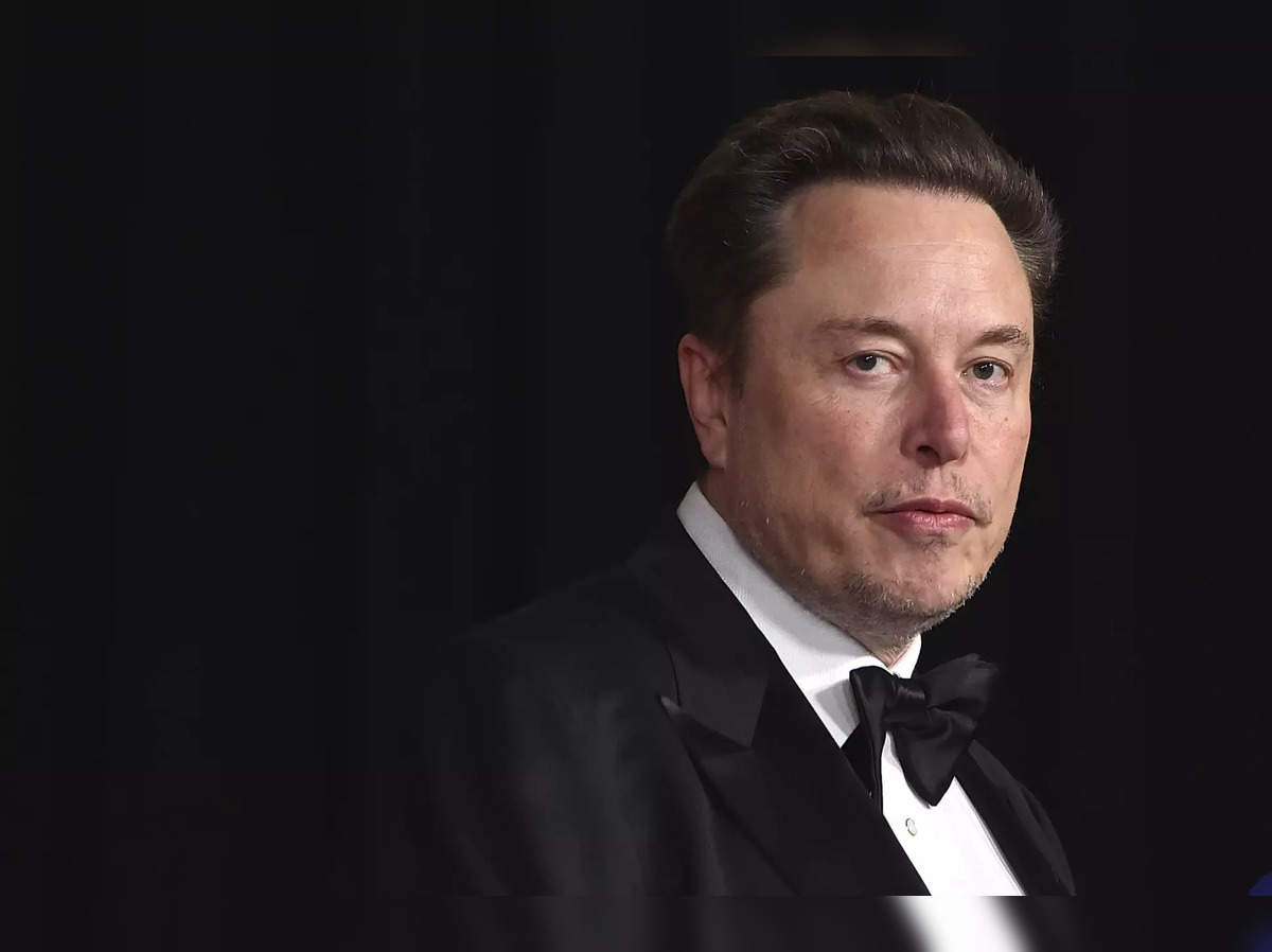 Elon Musk: Elon Musk warns that he will ban Apple devices if OpenAI is  integrated at operating system level - The Economic Times