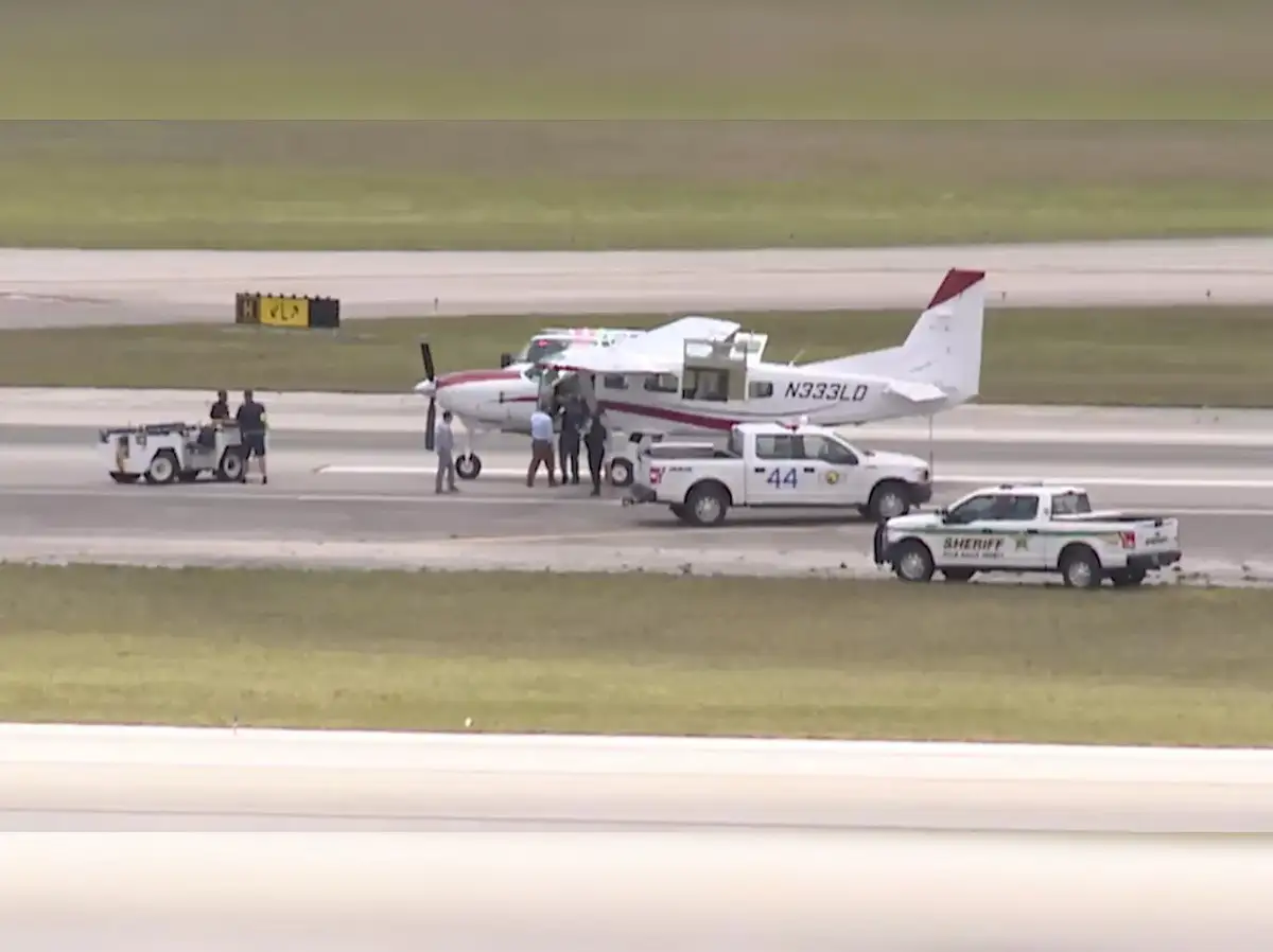 plane news: Pilot down, passenger takes over with  