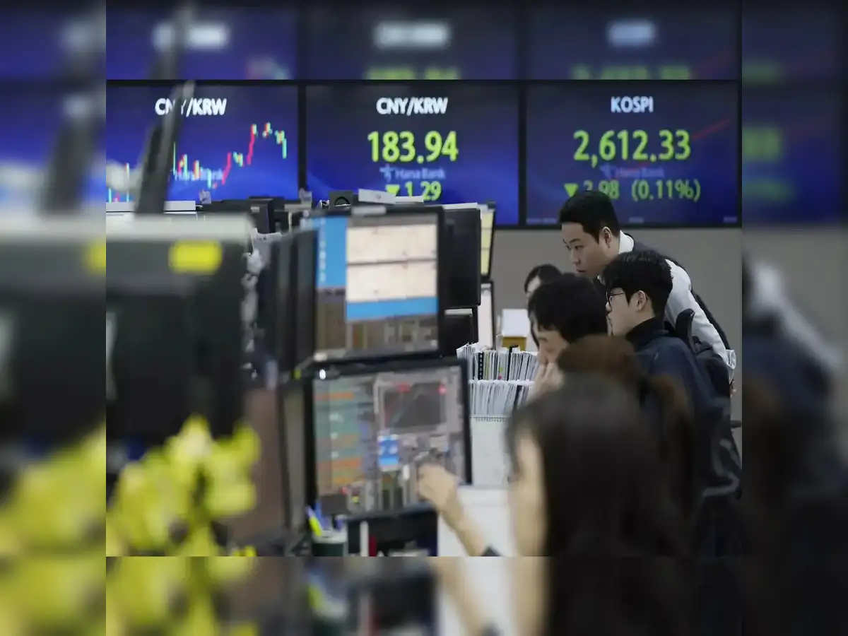 South Korean shares hit record high as tax hike plan scrapped
