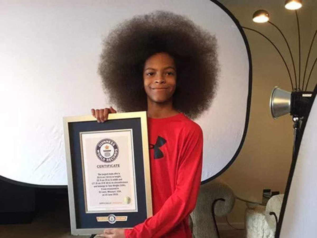 Guinness World Record: 13-year-old boy with world's largest Afro, measuring   cms - The Economic Times