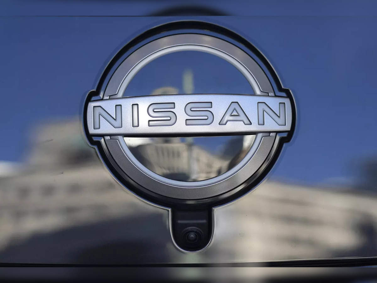 The Nissan logo. What the symbol means and the company history