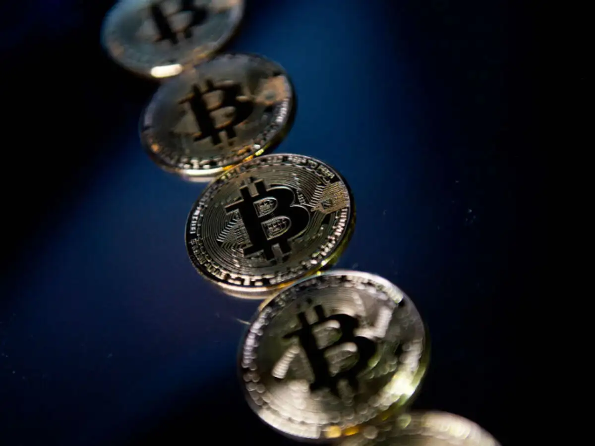 cryptocurrency: What happens to cryptocurrency you buy if India decides to  ban it - The Economic Times