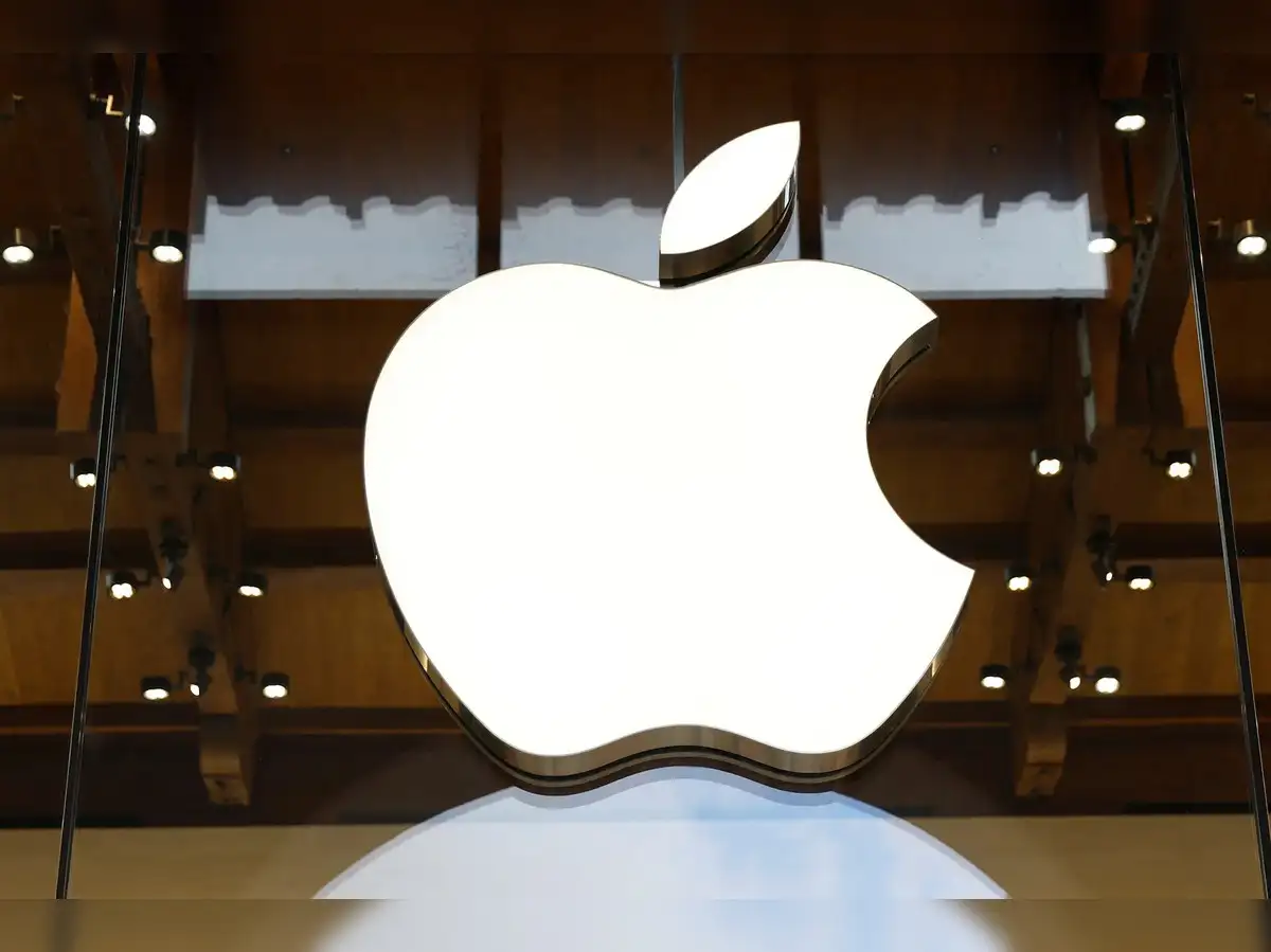 German publishers protesting Apple's app tracking transparency rules, with an Apple logo in the background.
