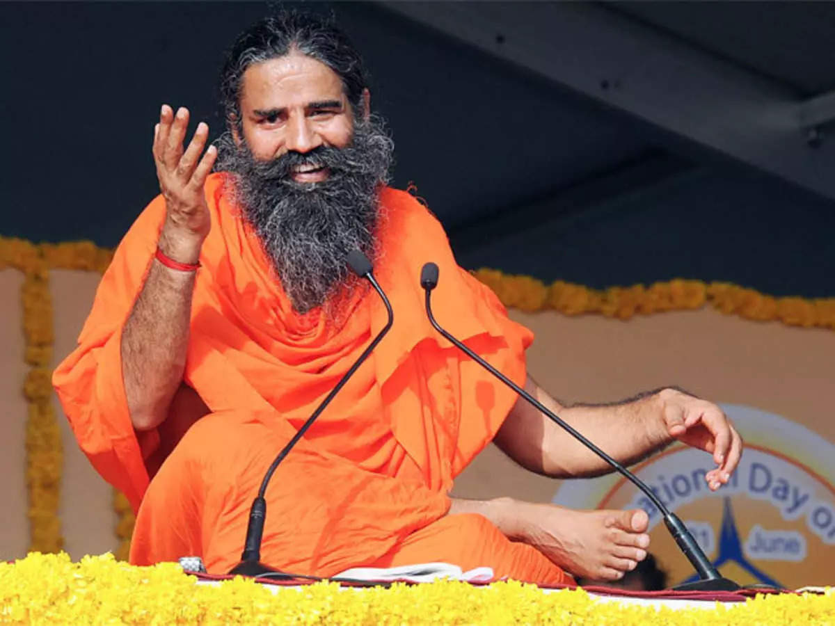 ramdev: Two booked for making indecent cartoon of Ramdev - The Economic  Times