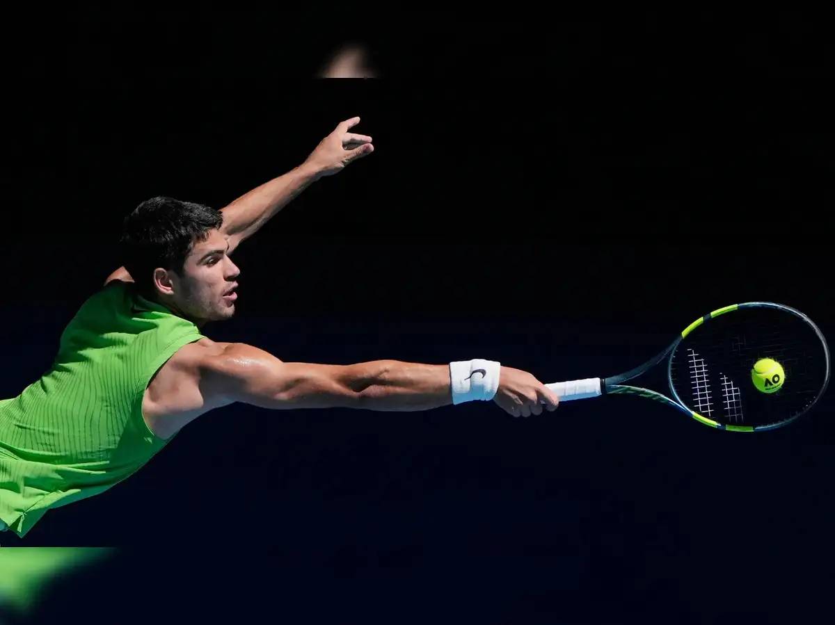 Carlos Alcaraz overcomes Tommy Paul in straight sets to reach Australian Open quarter-finals amid medical delay