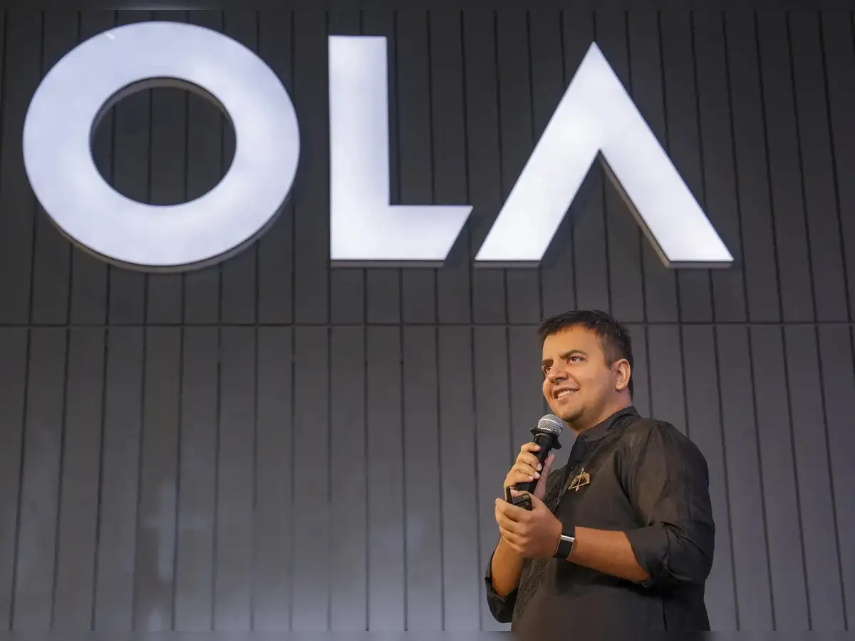 Ola Electric’s Bhavish Aggarwal to sell 2.8% stake to clear pledged shares; promoter group holding to slip to 34% - The Economic Times
