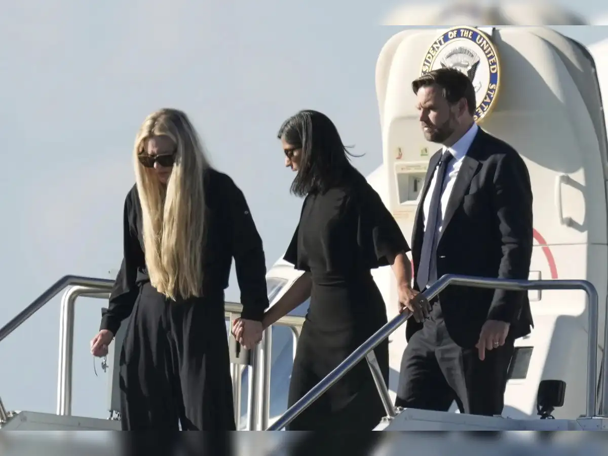 Erika Kirk, Charlie's widow seen first time after his killing; Usha Vance  comforts her as his body is brought out of Air Force Two, JD Vance carries  the casket - The Economic