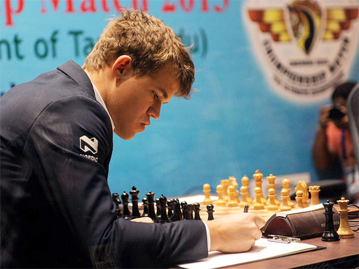 Magnus Carlsen wins longest world championship game ever to seize advantage  - ESPN