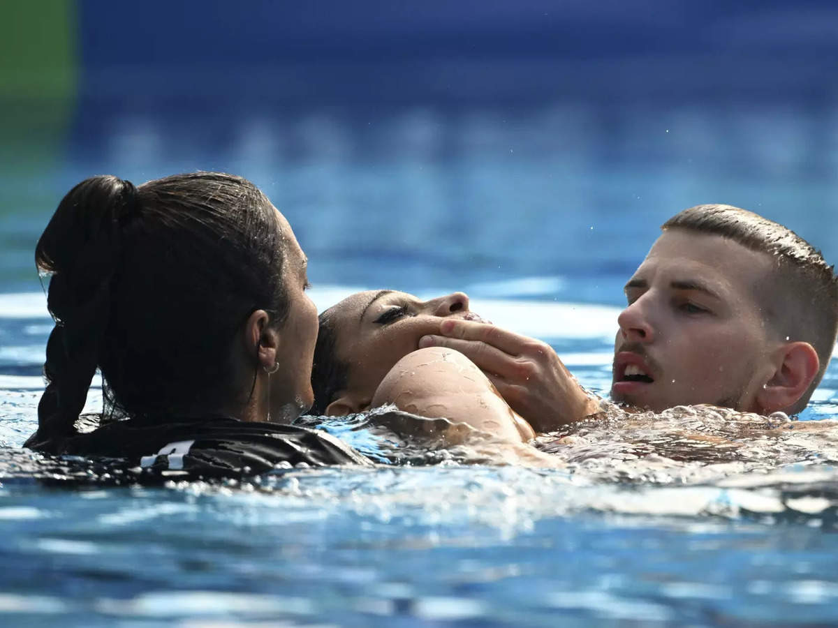 anita alvarez: . Coach prevents a possible tragedy, rescues artistic  swimmer Anita Alvarez at World Championships - The Economic Times