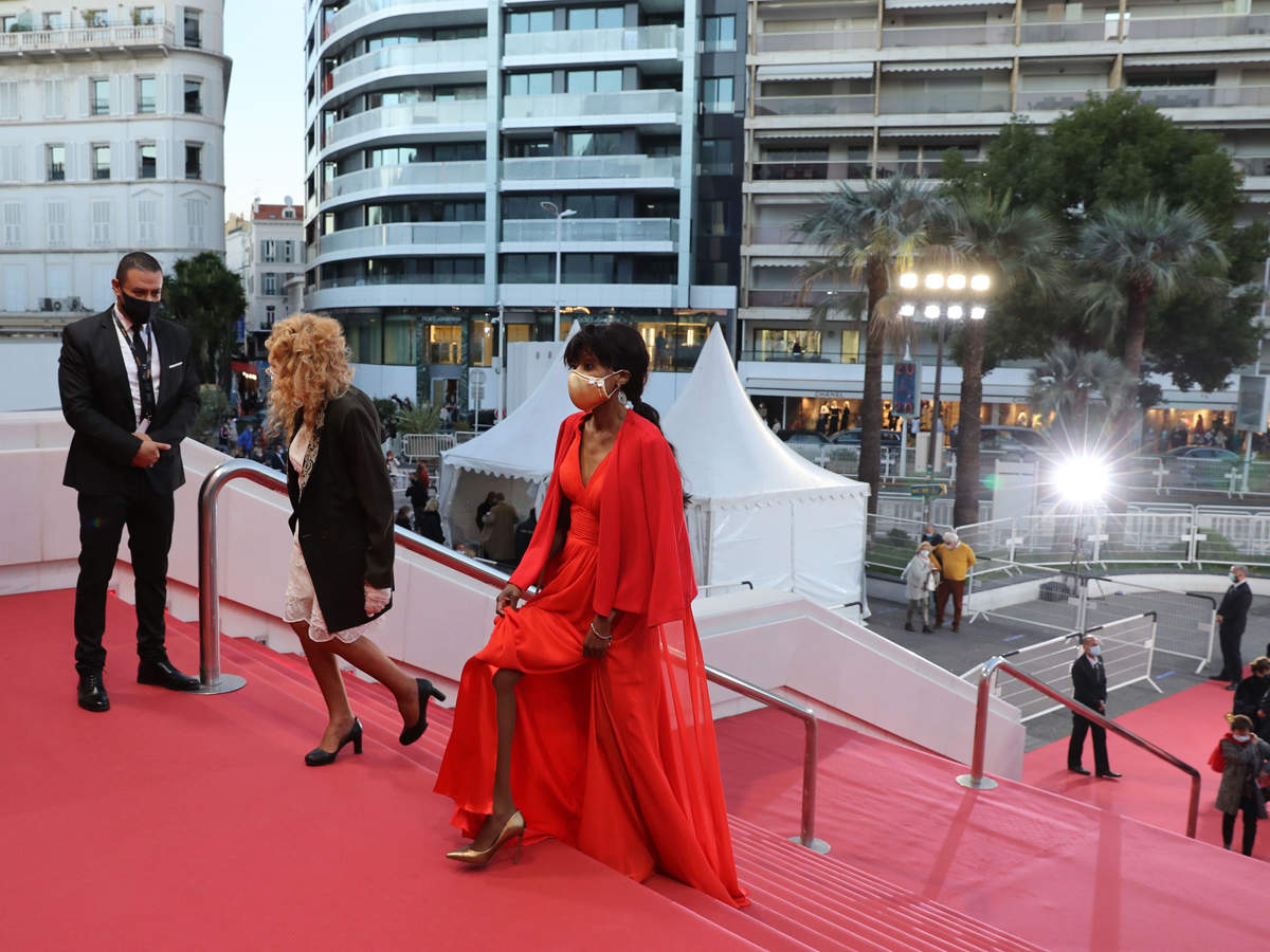 cannes film festival: Face masks, long gowns & movies: Quieter version of  Cannes rolls out red carpet for pared-back film showcase - The Economic  Times