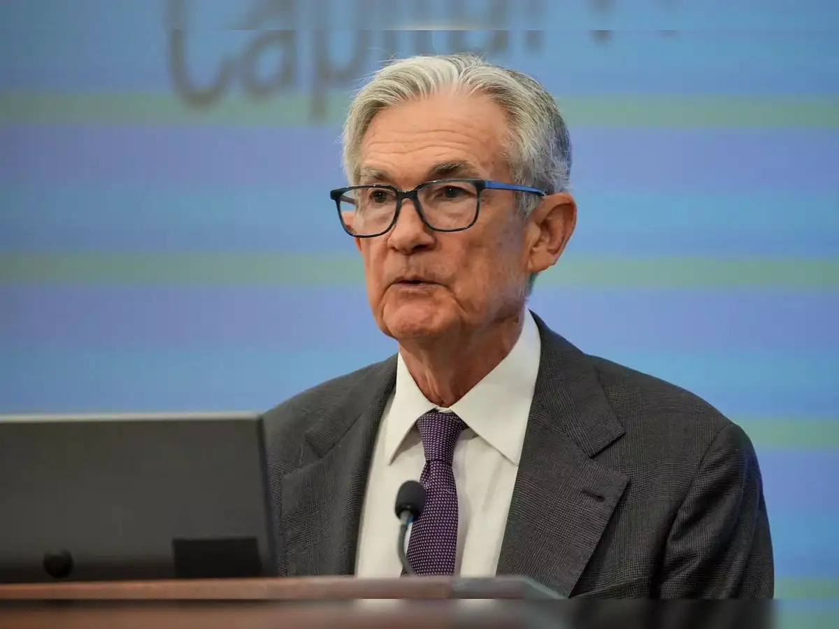 Fed's Powell hints at early rate cut. Dow surges 870 points, Nasdaq 420;  Cboe drops 12% - The Economic Times