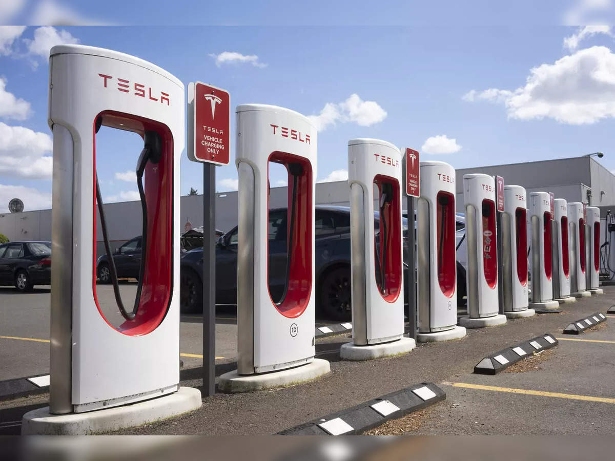 tesla charging: Automakers plug into Tesla's EV charging network