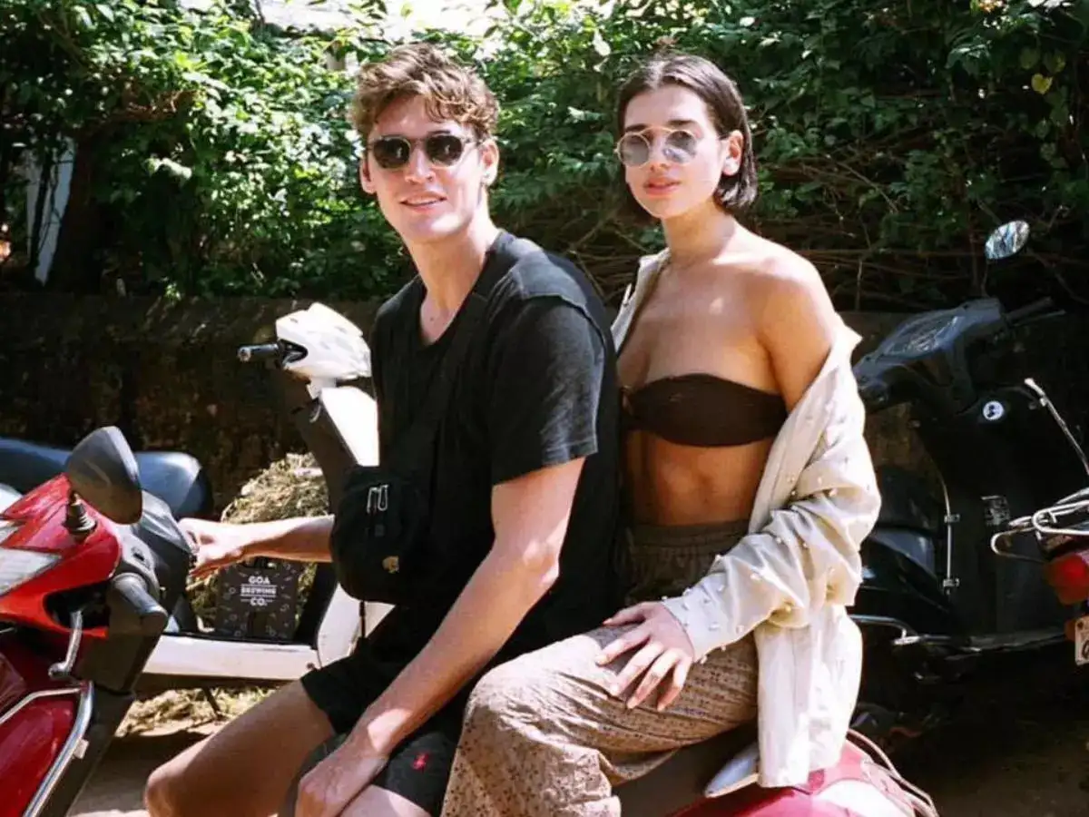 Dua Lipa displaying her unique turtle manicure