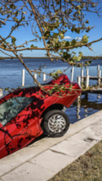 Hurricane Ian's aftermath, in pictures: Boats in the streets, cars in the sea
