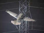 US: Plane stuck in power lines; 2 people rescued