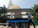 Sensex ends marginally lower; Nifty near 17K
