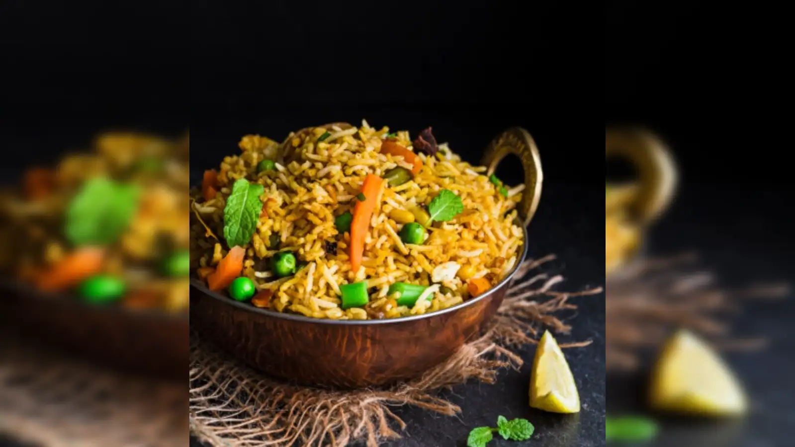 https://img.etimg.com/thumb/width-1600%2Cheight-900%2Cimgsize-308521%2Cresizemode-75%2Cmsid-124608981/news/international/us/chicken-biryani-or-hyderabadi-vegetable-dum-biryani-discover-the-best-types-of-biryani-and-top-rated-nyc-restaurants-for-each-check-list.jpg
