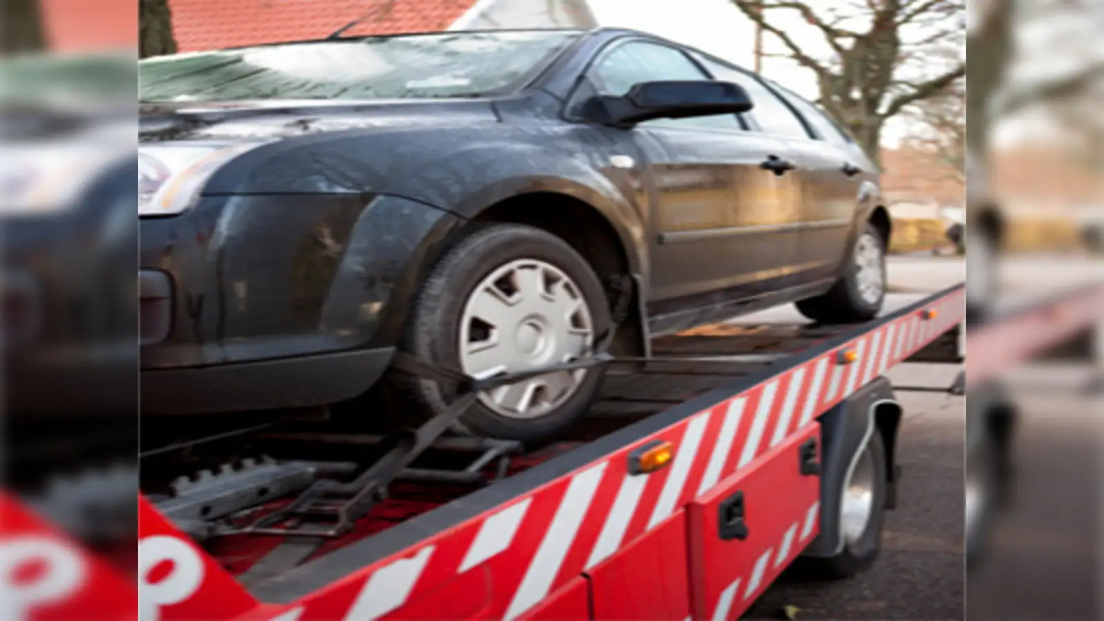 Can Your Car Get Towed With the Emergency Brake On? Essential Facts
