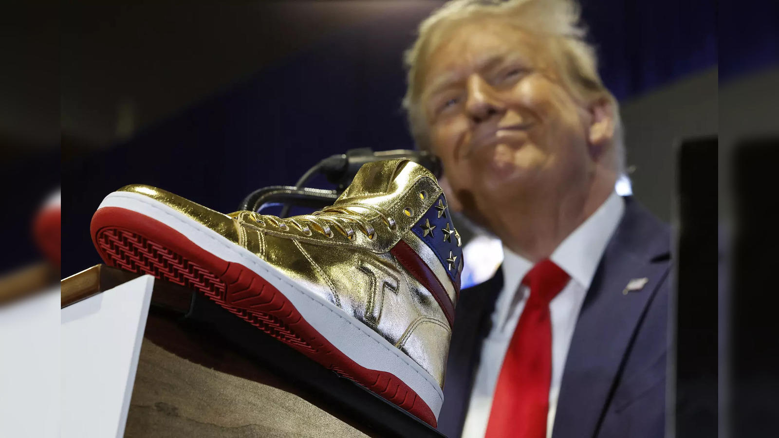 Donald Trump sneakers: Roman Sharf: The Russian CEO who won autographed  pair of Trump's golden sneakers - The Economic Times