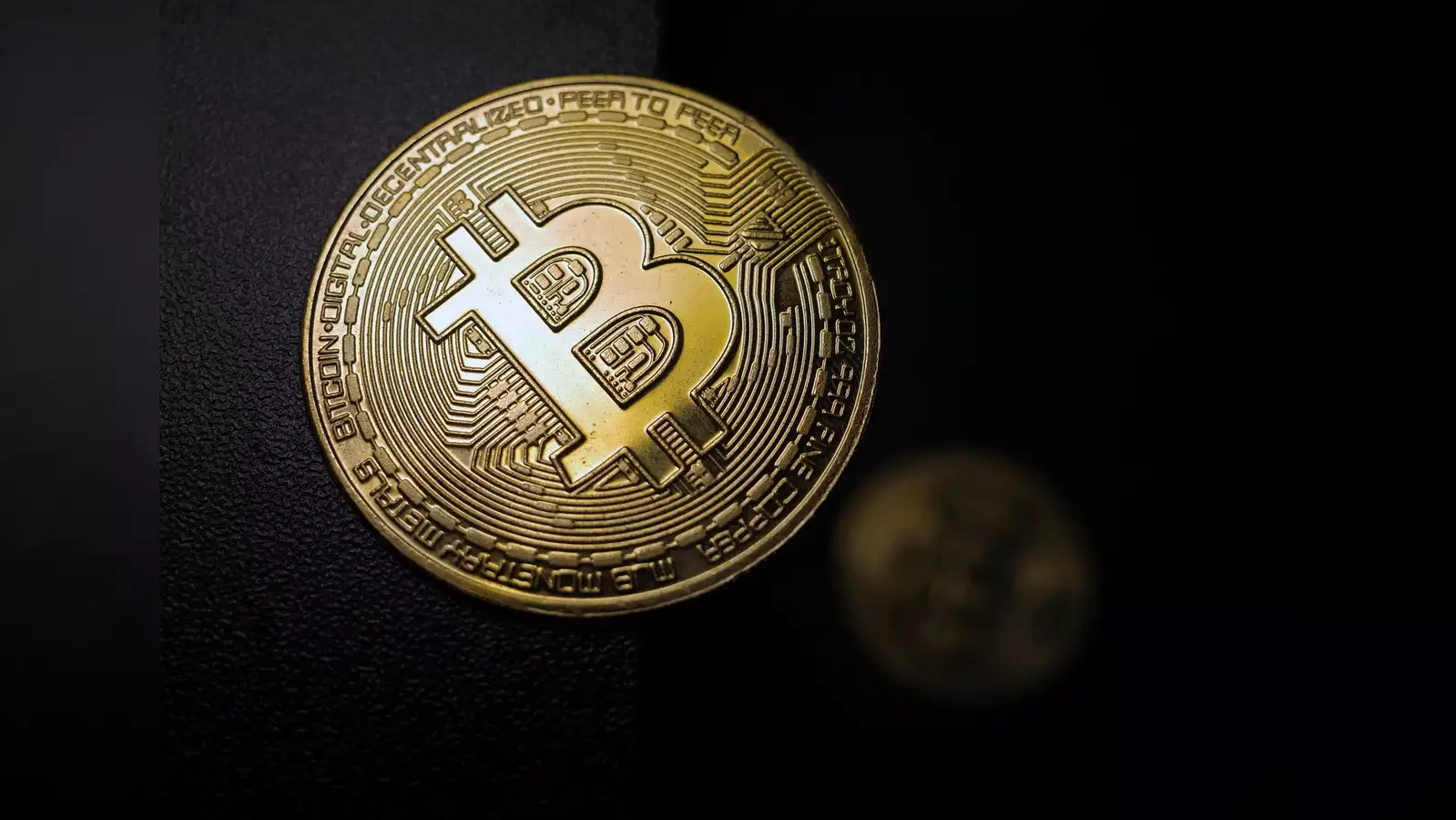 cryptocurrency: Bitcoin gives up gains after BlackRock denies ETF approval  report - The Economic Times