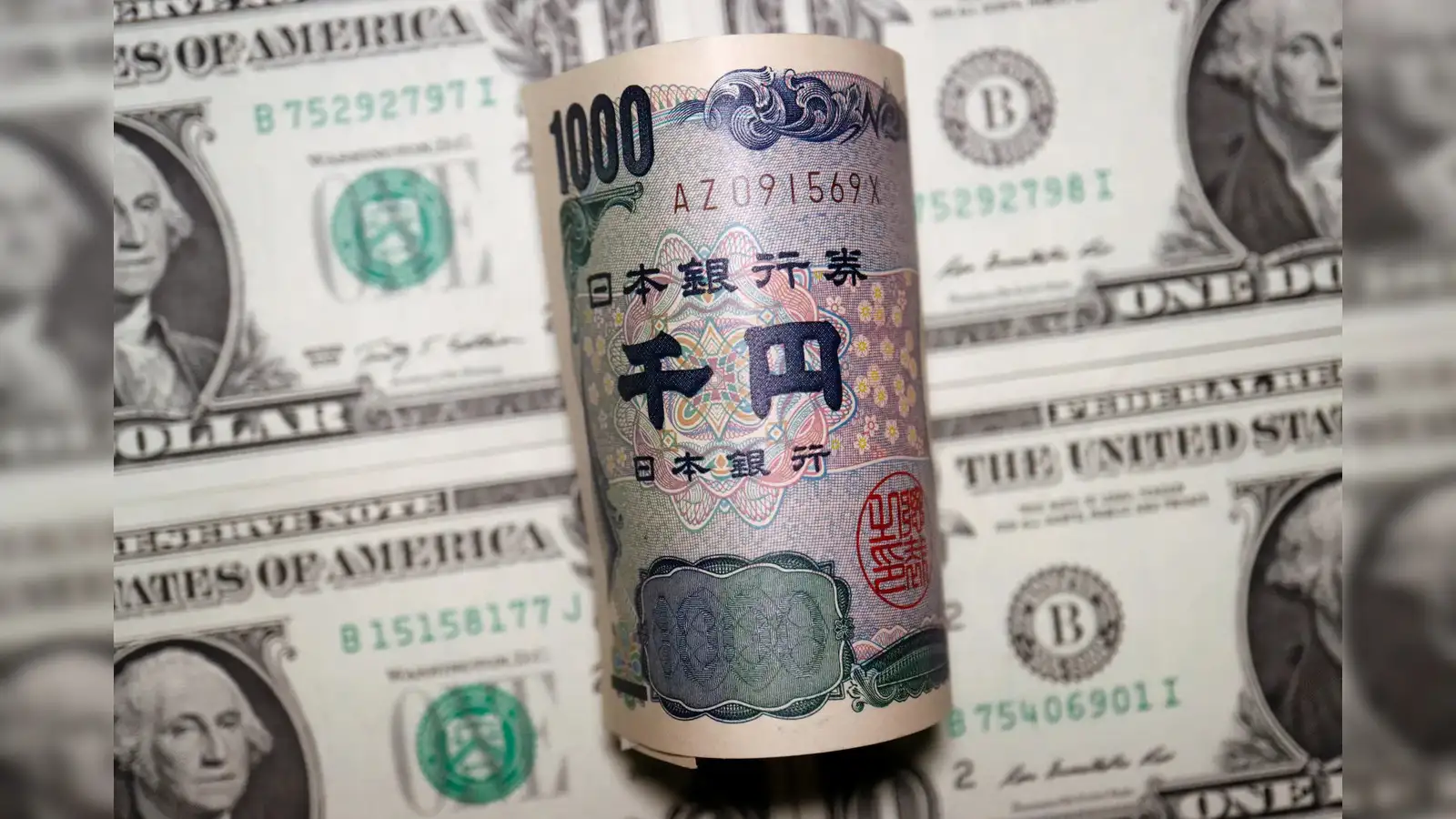Yen weak, dollar steady in countdown to Fed - The Economic Times