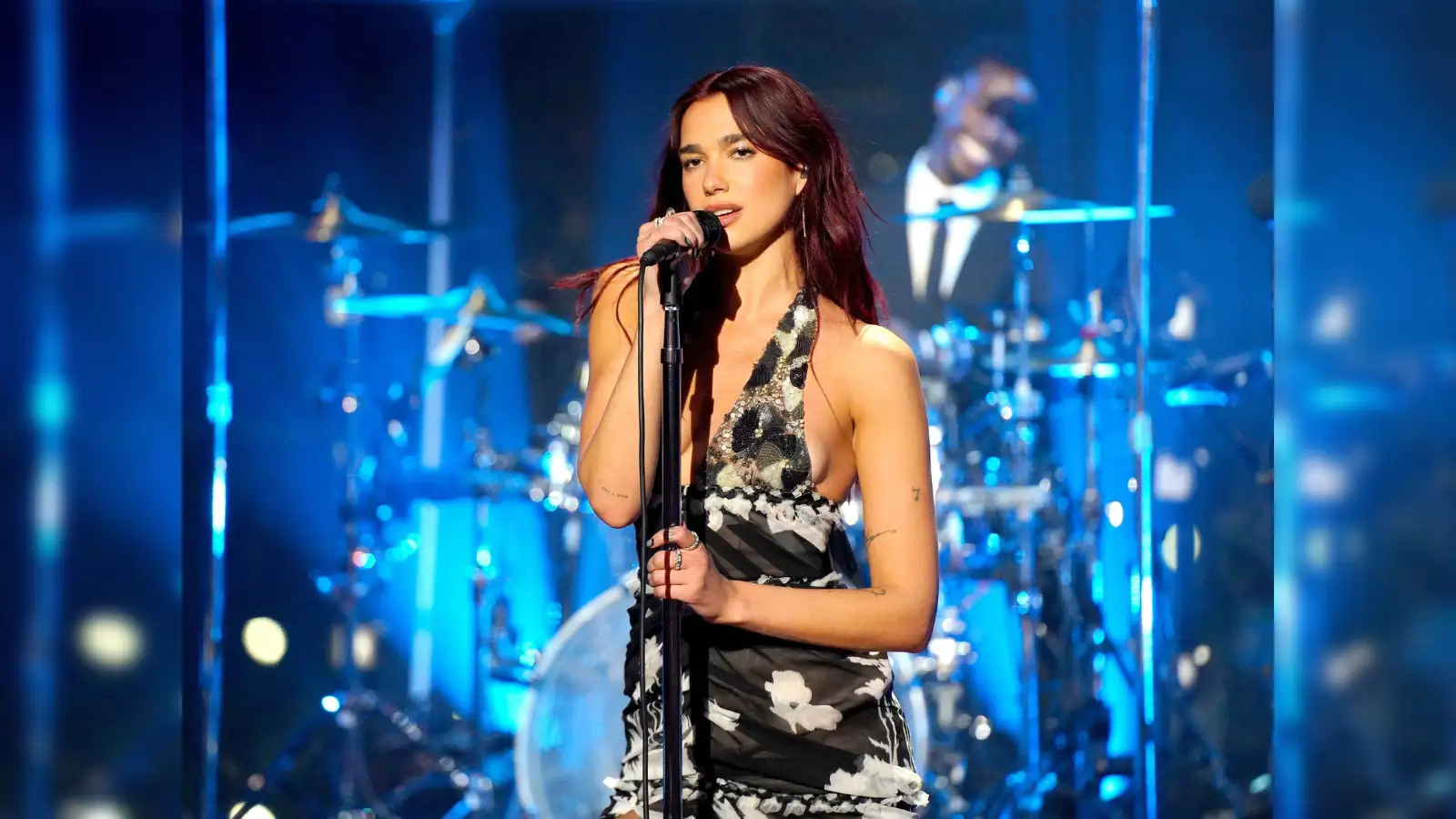 dua lipa: Dua Lipa announces her 2025 visit to Anfield; Liverpool fans sing  One Kiss, - The Economic Times