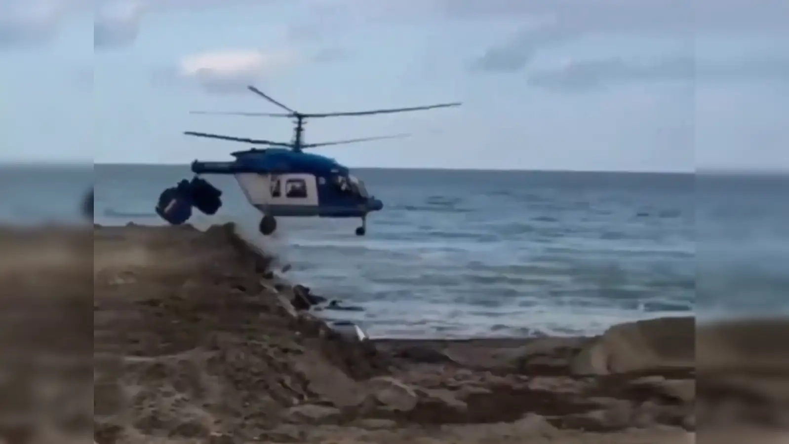 Watch: Russian chopper breaks into two, then hovers mid-air before fiery  crash. Shocking video goes viral - The Economic Times