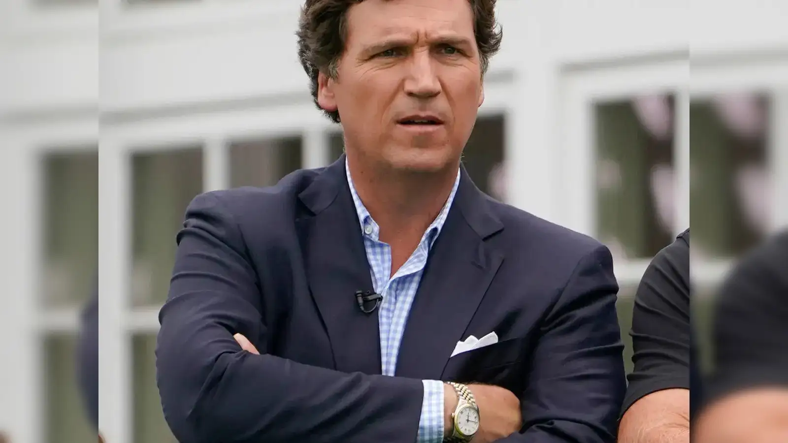 julian assange: Tucker Carlson, Former Fox News Host, Visits Julian Assange  in Prison - The Economic Times