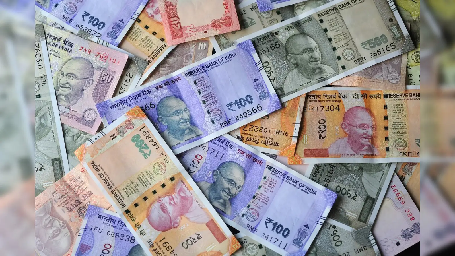 Rupee rises 10 paise to settle at 87.78 against US dollar - The Economic  Times