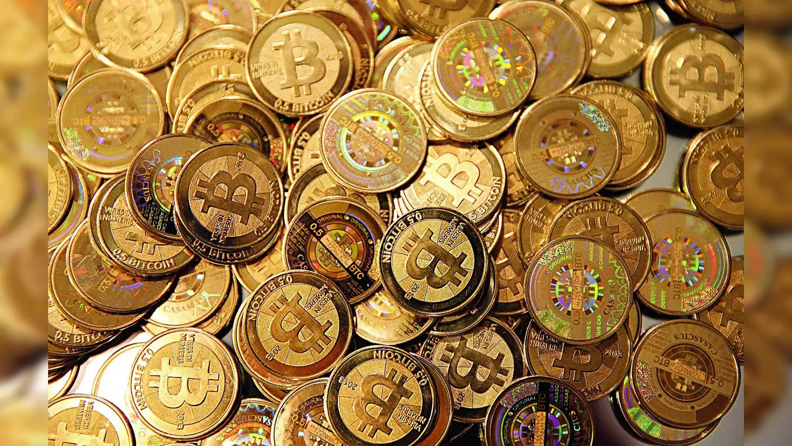 bitcoin price: Cryptocurrency Price on May 30: Bitcoin dips below $67.8k  level; Shiba Inu, Polkadot tank over 5% - The Economic Times