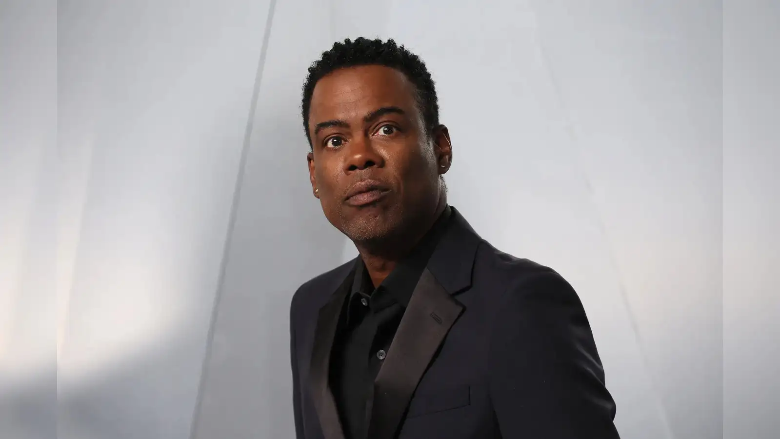 A decade after divorce, Chris Rock's romance heats up with a younger DJ - here's who he's dating