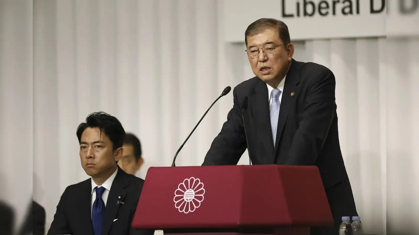 Nine ruling party candidates in Japan vie to replace outgoing Prime Minister - The Economic Times