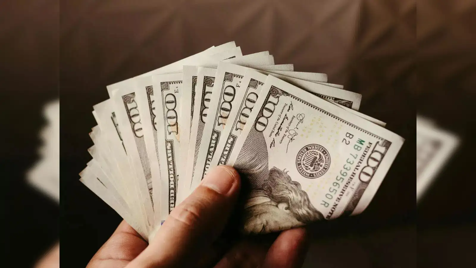 Dollar holds near three-week high before CPI data; Bitcoin hovers above  $120,000 - The Economic Times