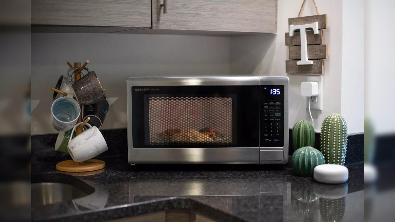 https://img.etimg.com/thumb/width-1600,height-900,imgsize-91530,resizemode-75,msid-102638218/top-trending-products/kitchen-dining/microwave/5-best-microwaves-under-25000-for-unmatched-cooking-convenience.jpg