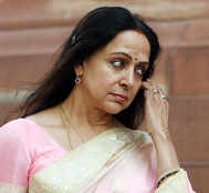 Hema Malini escapes a mishap as tree falls in front of her convoy in Mathura