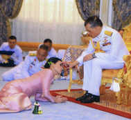 Thai king marries bodyguard - a former flight attendant - in surprise wedding, makes her Queen