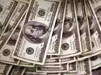Dollar holds firm as French fiscal woes keep euro on back foot