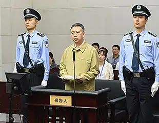 China's former Interpol chief sentenced to 13 years in prison
