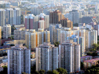 Cash-rich realtors like RMZ, Shriram Properties & others exit partly completed projects at big discounts