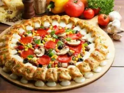 Domino's, Pizza Hut use delivery and dine-ins to whet the taste buds of demanding Indians - The Economic Times