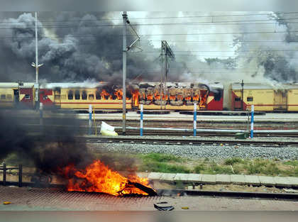 One killed, trains torched as Agnipath protests singe India